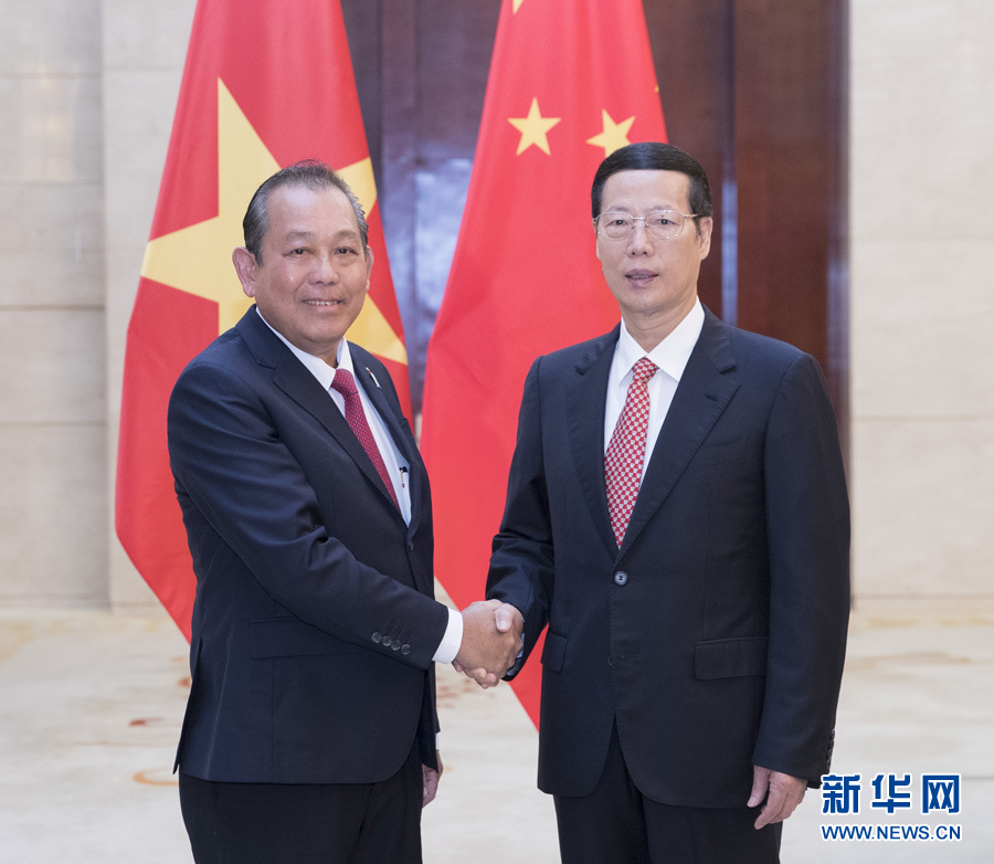  9月11日，中共中央政治局常委、國(guó)務(wù)院副總理張高麗在廣西南寧會(huì)見前來(lái)出席第十四屆中國(guó)－東盟博覽會(huì)和中國(guó)－東盟商務(wù)與投資峰會(huì)的越南常務(wù)副總理張和平。新華社記者王曄攝