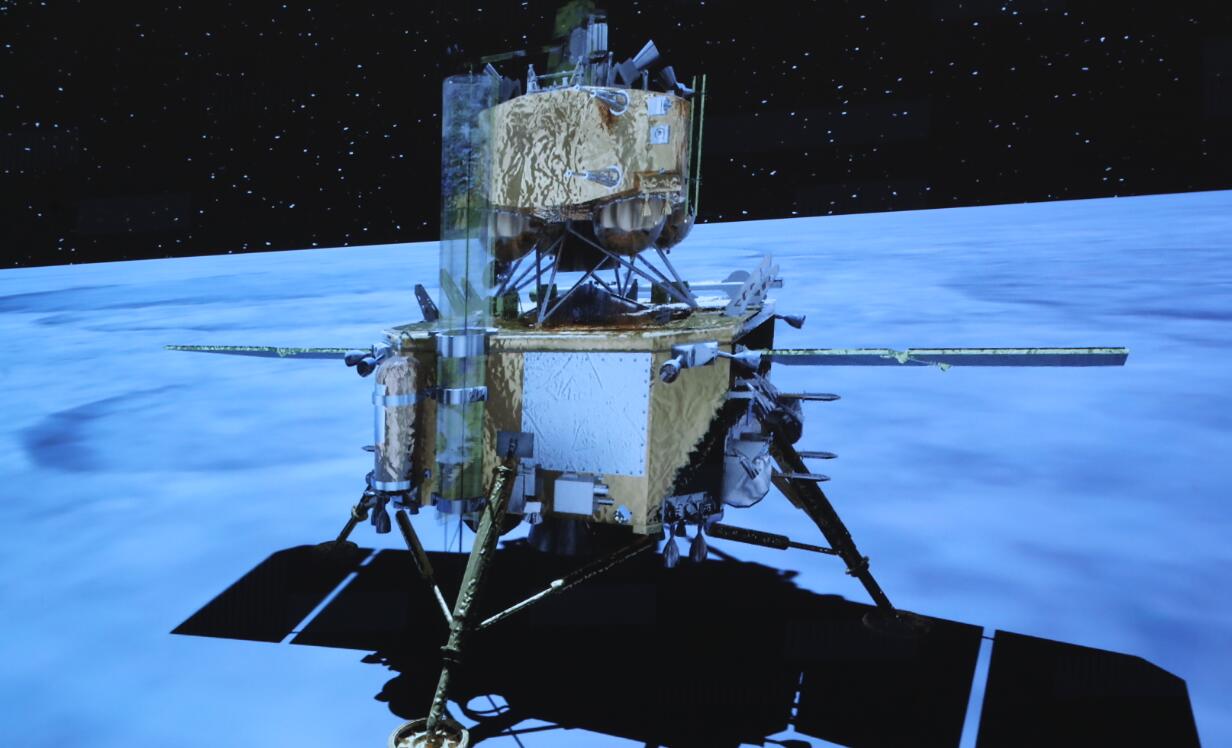 嫦娥五號(hào)探測器實(shí)施動(dòng)力下降并成功著陸