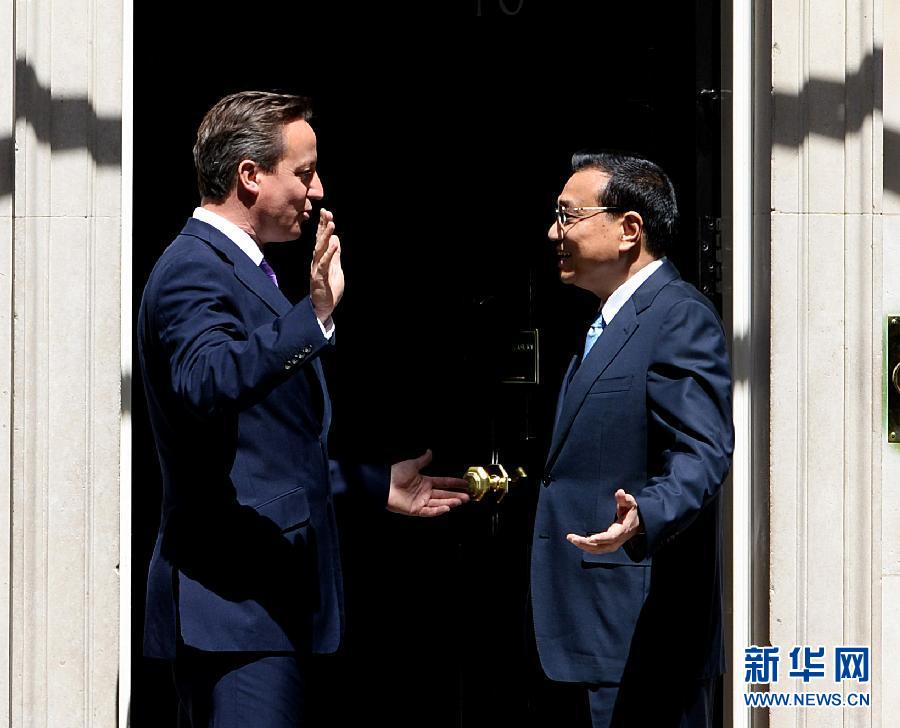 6月17日，中國國務(wù)院總理李克強在倫敦唐寧街10號首相府同英國首相卡梅倫舉行中英總理年度會晤。新華社記者 李濤 攝