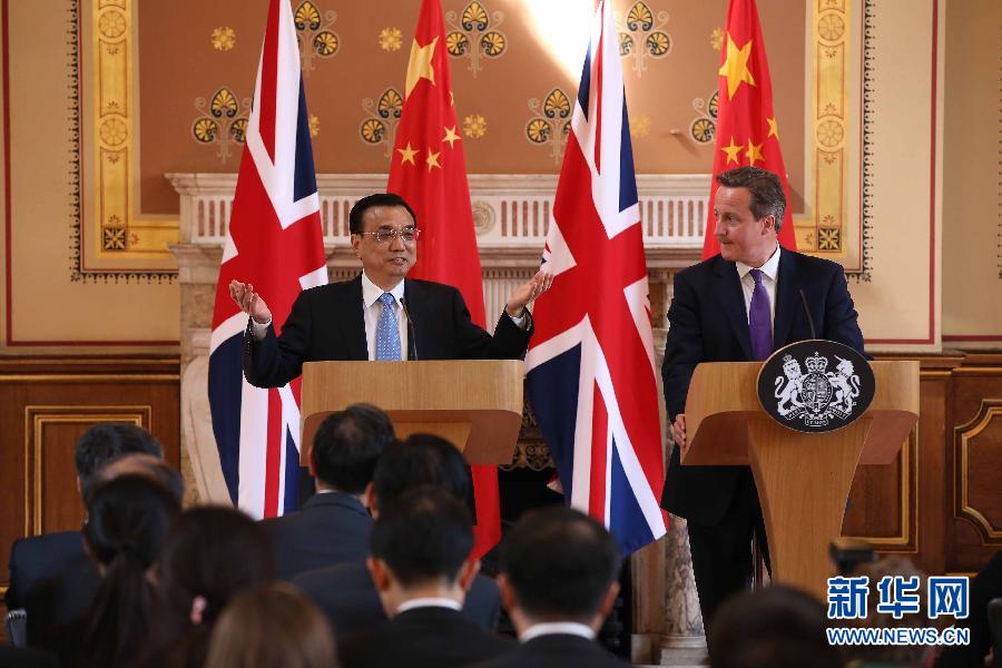 6月17日，國(guó)務(wù)院總理李克強(qiáng)同英國(guó)首相卡梅倫在倫敦舉行中英總理年度會(huì)晤后共同會(huì)見記者。新華社記者 龐興雷 攝