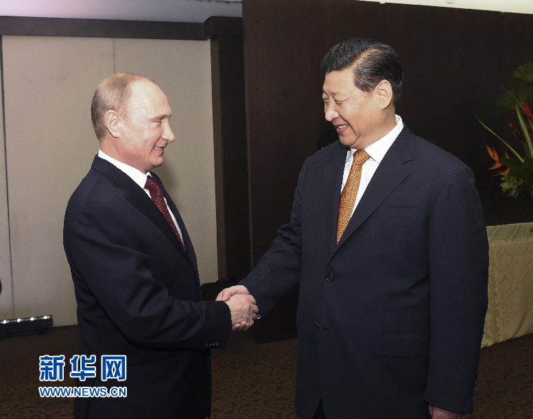 7月14日，國家主席習(xí)近平在巴西福塔萊薩會見俄羅斯總統(tǒng)普京。新華社記者李學(xué)仁攝
