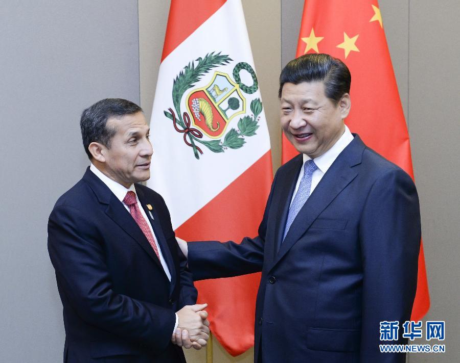 7月16日，國家主席習近平在巴西首都巴西利亞會見秘魯總統(tǒng)烏馬拉。新華社記者 劉建生 攝 