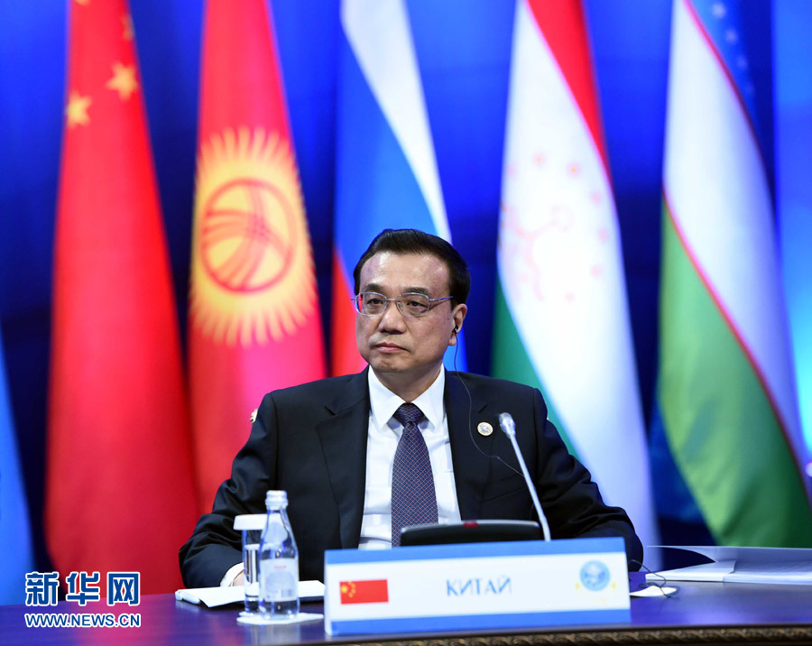 12月15日，中國國務(wù)院總理李克強(qiáng)在阿斯塔納出席上海合作組織成員國政府首腦理事會第十三次會議。 新華社記者 饒愛民 攝