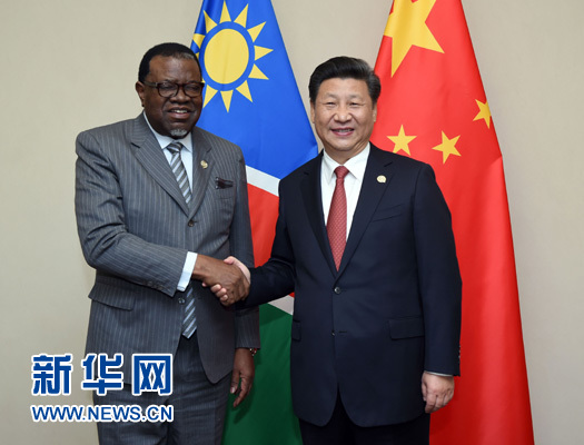 12月4日，國(guó)家主席習(xí)近平在約翰內(nèi)斯堡會(huì)見納米比亞總統(tǒng)根哥布。 新華社記者 張鐸 攝