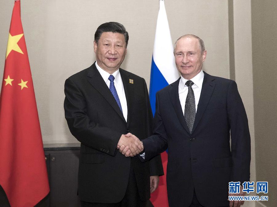 6月8日，國(guó)家主席習(xí)近平在阿斯塔納會(huì)見俄羅斯總統(tǒng)普京。 新華社記者蘭紅光 攝