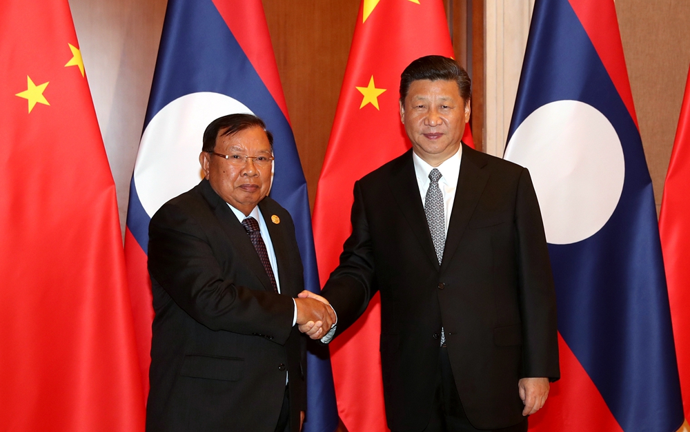 習(xí)近平同老撾人民革命黨中央總書記、國家主席本揚(yáng)舉行會(huì)談